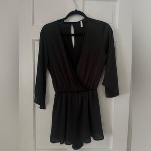 Never worn black silky romper, size small
